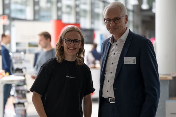 Präsident Karl Stoffel und Frühstudent Jonathan Baschek