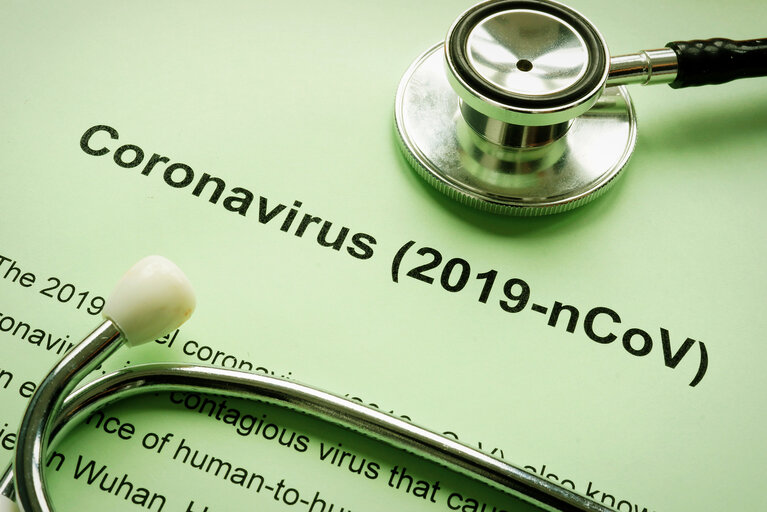 Coronavirus 2019-nCoV or Wuhan pneumonia virus and stethoscope.