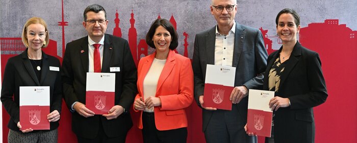 Minster mit Präsident und Geschäftsführer
