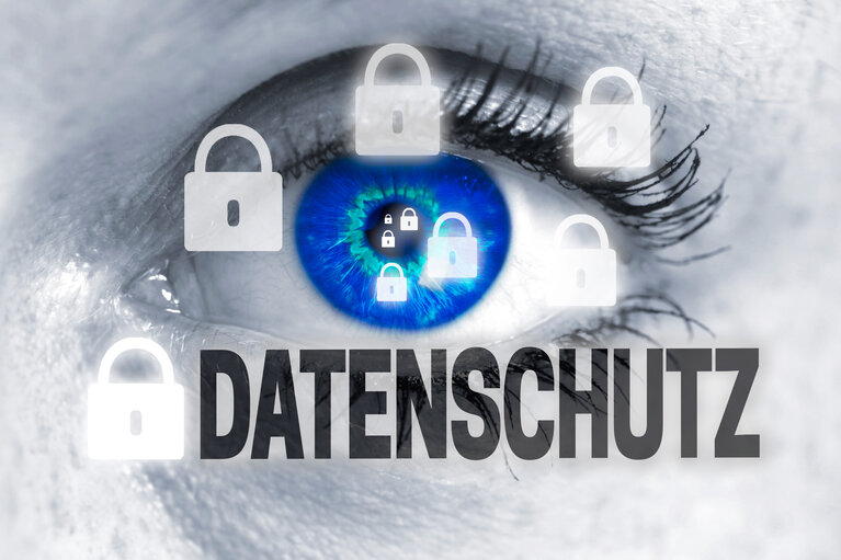 datenschutz (in german data protection) eye looks at viewer concept