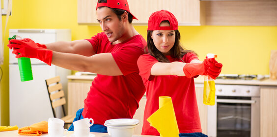Cleaning professional contractors working at kitchen
