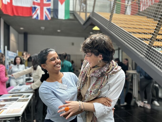 Two ERASMUS exchange students talking to each other