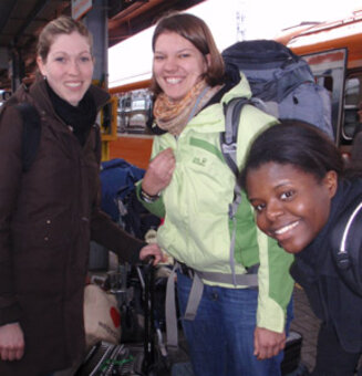 three students at the trainstation